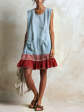 Katia | Robe tunique bleu ciel sans manches avec bande rouge et ourlet froncé