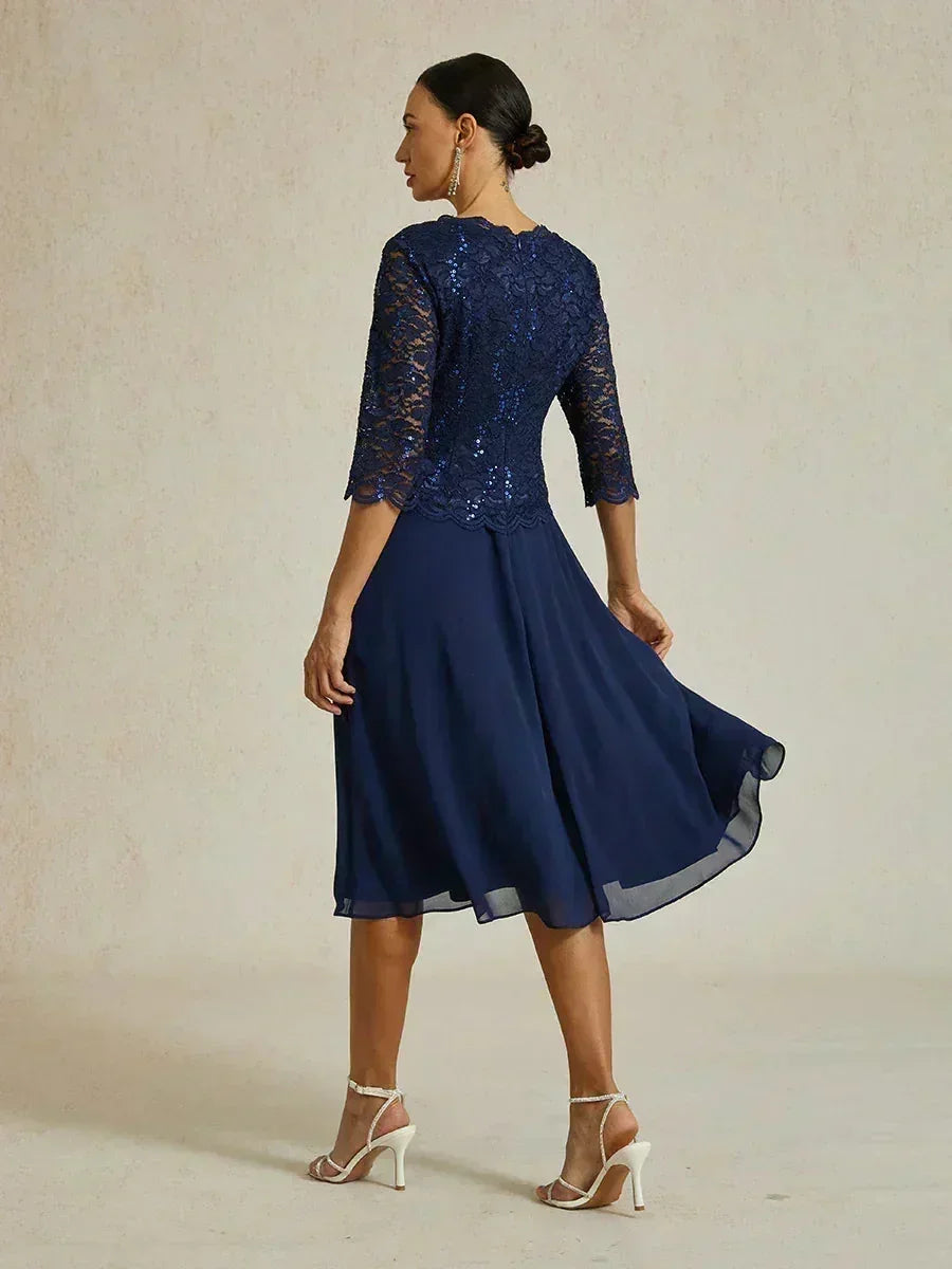 Robe midi en dentelle à manches trois quarts
