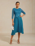 Robe midi en dentelle à manches trois quarts