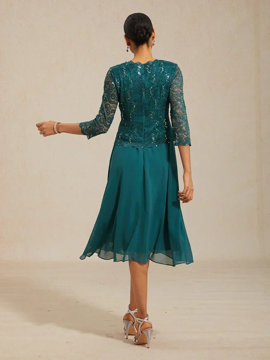 Robe midi en dentelle à manches trois quarts
