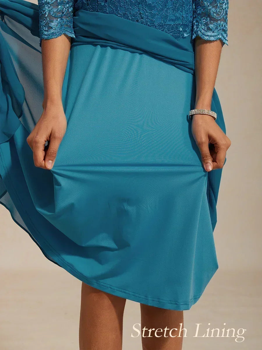 Robe midi en dentelle à manches trois quarts