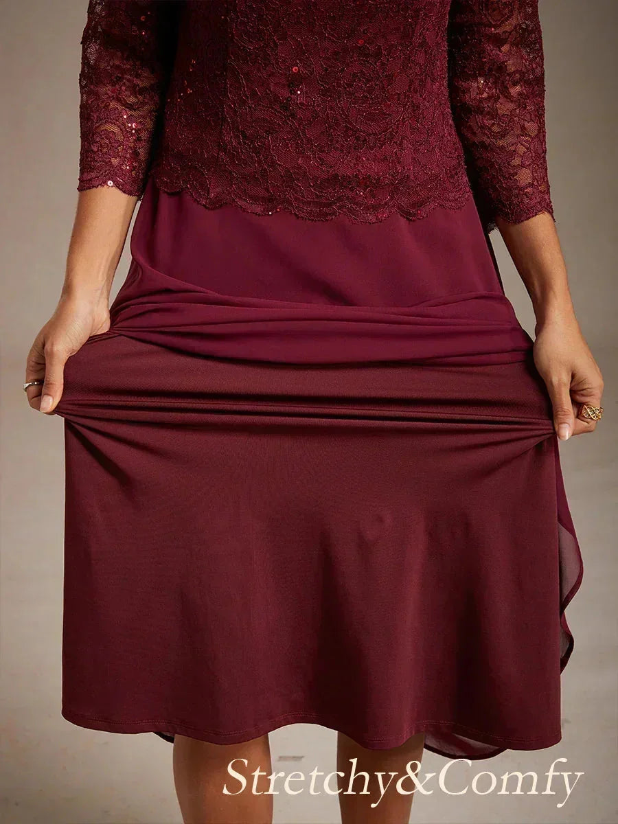 Robe midi en dentelle à manches trois quarts