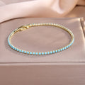 Aurora | Goldenes Tennis-Armband mit Türkis