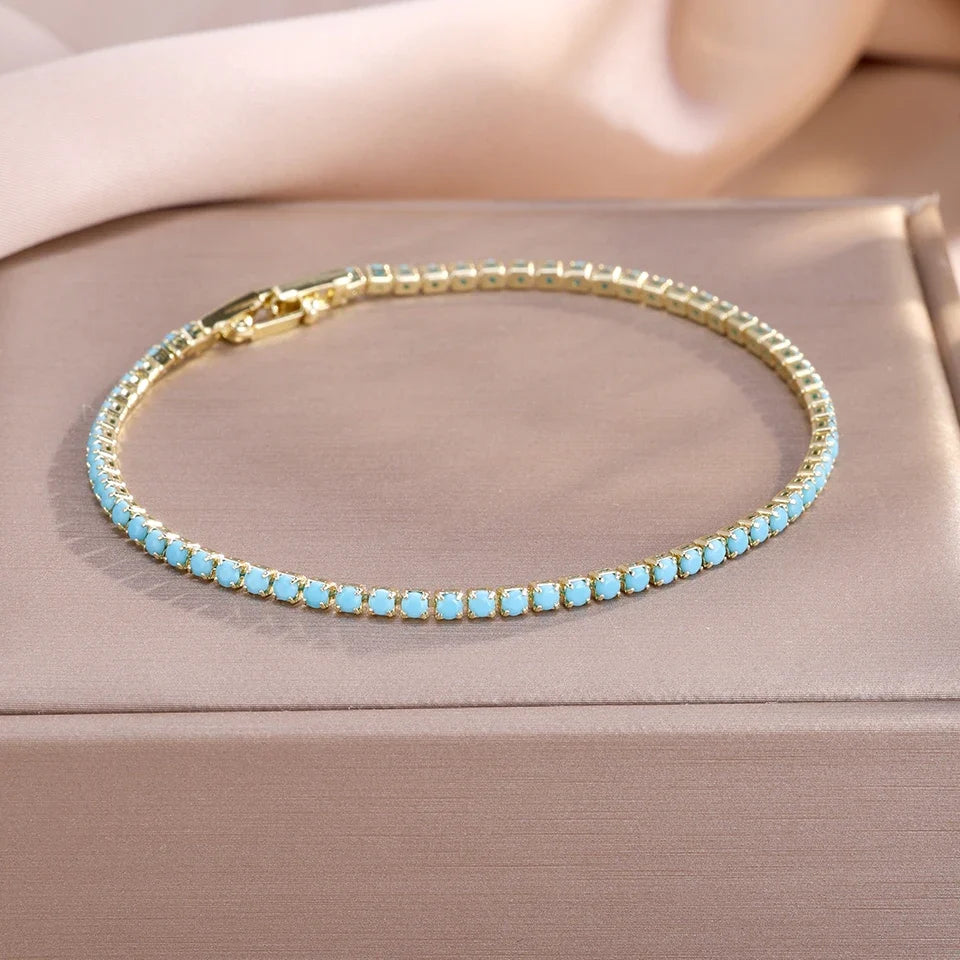 Aurora | Bracelet tennis doré avec turquoise