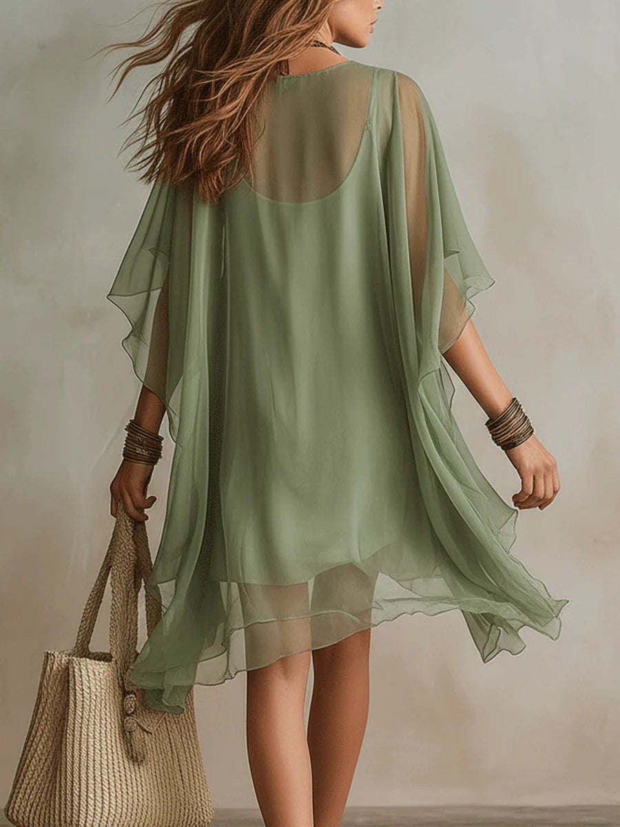 Mini-robe verte aérienne en mousseline avec décolleté en V