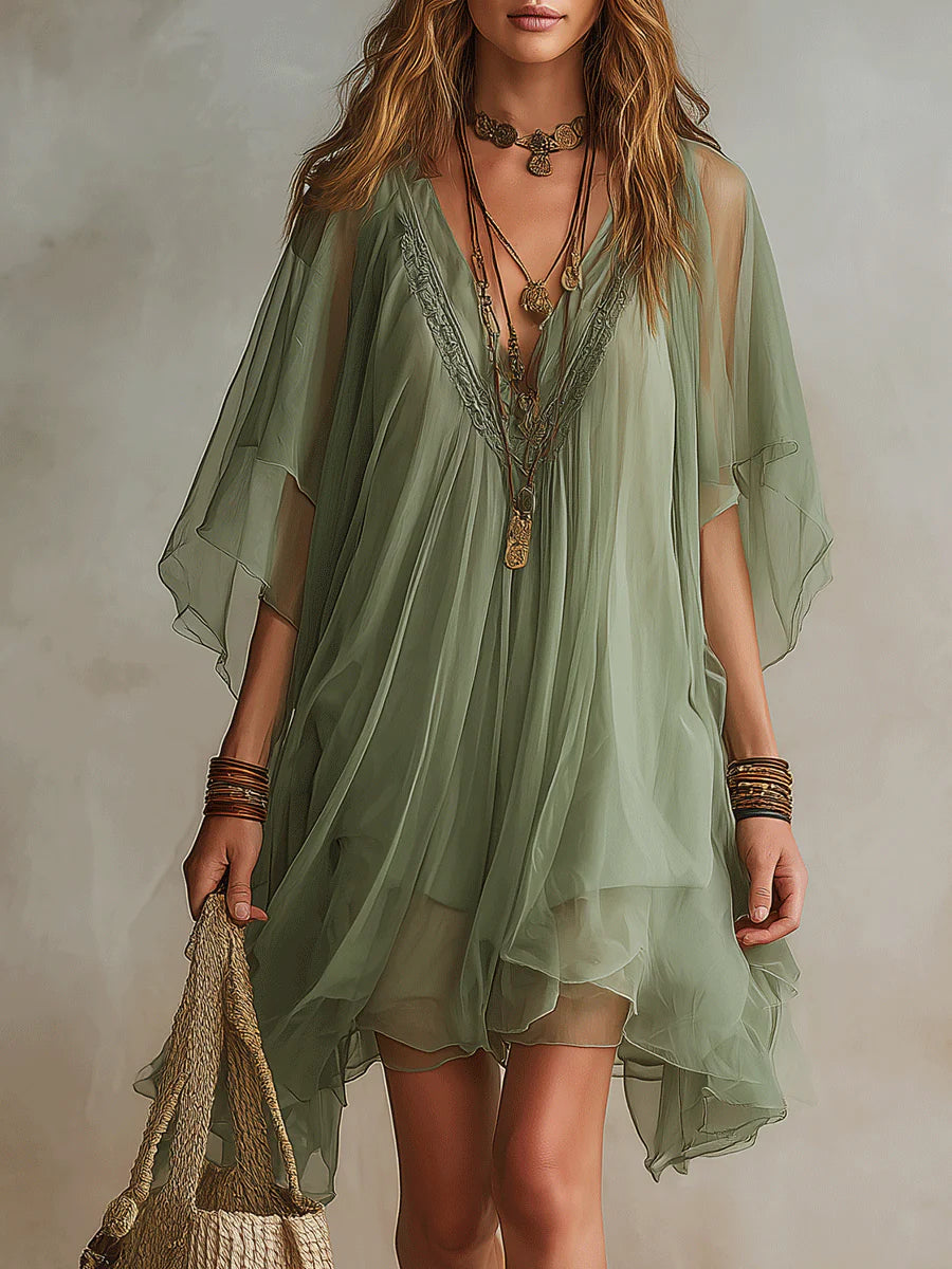 Mini-robe verte aérienne en mousseline avec décolleté en V